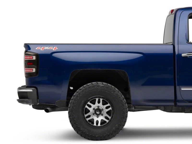 Load image into Gallery viewer, Raxiom 14-18 Chevrolet Silverado 1500 LED Taillights w/ SEQL Turn Signals- Blk Housing (Clear Lens)
