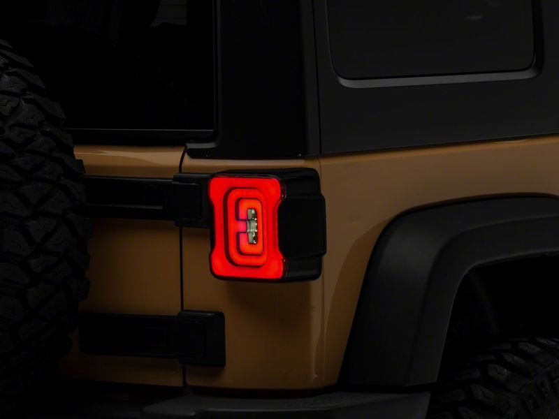 Load image into Gallery viewer, Raxiom 07-18 Jeep Wrangler JK Axial Series LED Tail Lights- Blk Housing (Smoked Lens)
