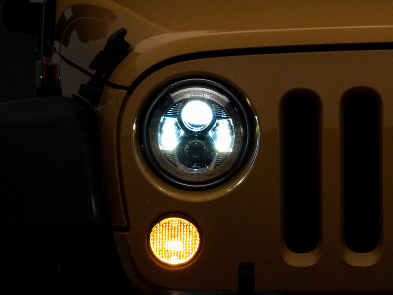 Load image into Gallery viewer, Raxiom 07-18 Jeep Wrangler JK 7-In LED Headlights- Chrome Housing (Clear Lens)
