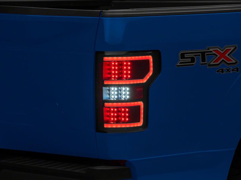 Load image into Gallery viewer, Raxiom 18-20 Ford F-150 LED Tail Lights- Blk Housing (Clear Lens)
