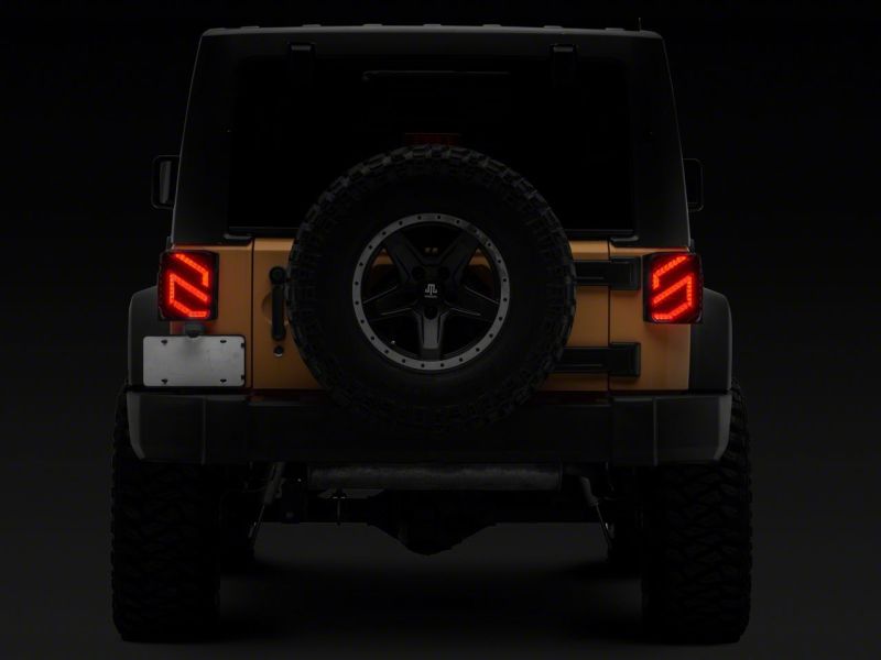 Load image into Gallery viewer, Raxiom 07-18 Jeep Wrangler JK Axial Series Trident LED Tail Lights- Blk Housing (Clear Lens)
