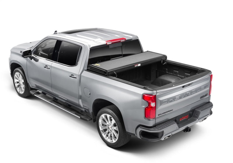 Load image into Gallery viewer, Extang 20-23 Chevy/GMC Silverado/Sierra 2500/3500HD (8ft. 2in. Bed) Solid Fold ALX
