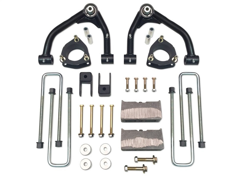 Load image into Gallery viewer, Tuff Country 14-18 Silverado 1500 4wd 4in Uni-Lift Kit (w/1 Pc OE Cast Stl Up Arm No Shocks)
