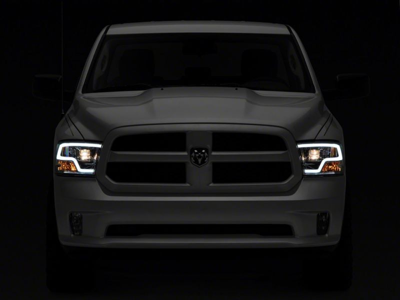 Load image into Gallery viewer, Raxiom 09-18 Dodge RAM 1500 Non-Projector LED Halo Headlights- Chrome Housing (Clear Lens)
