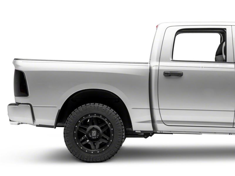 Load image into Gallery viewer, Raxiom 09-18 Dodge RAM 1500/2500/3500 Axial Series LED Tail Lights- BlkHousing- SmokedLens
