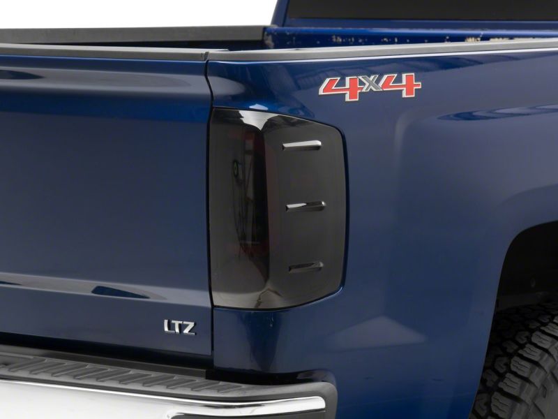 Load image into Gallery viewer, Raxiom 14-18 Chevrolet Silverado 1500 Axial Series LED Tail Lights- Blk Housing (Smoked Lens)
