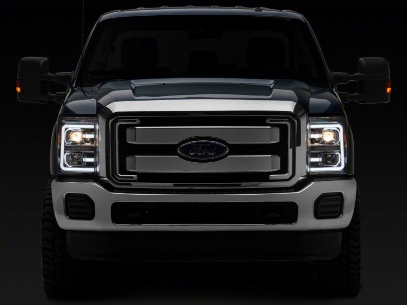 Load image into Gallery viewer, Raxiom 11-16 Ford F-250 Super Duty LED Projector Headlights - Chrome Housing (Clear Lens)
