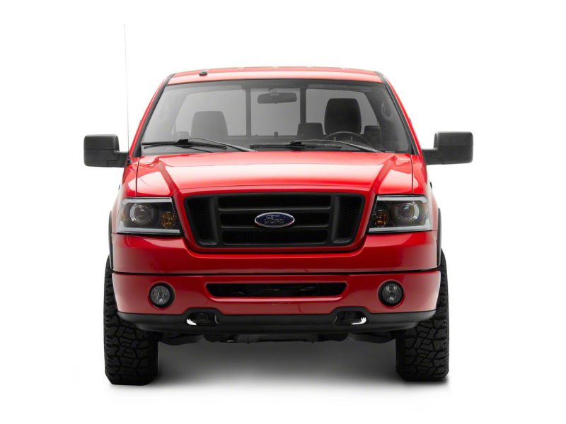 Load image into Gallery viewer, Raxiom 04-08 Ford F-150 Axial Series Projector Headlights w/ SEQL LED Bar- Blk Housing (Clear Lens)
