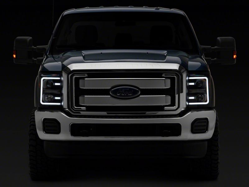 Load image into Gallery viewer, Raxiom 11-16 Ford F-250 Super Duty LED Projector Headlights - Blk Housing (Clear Lens)
