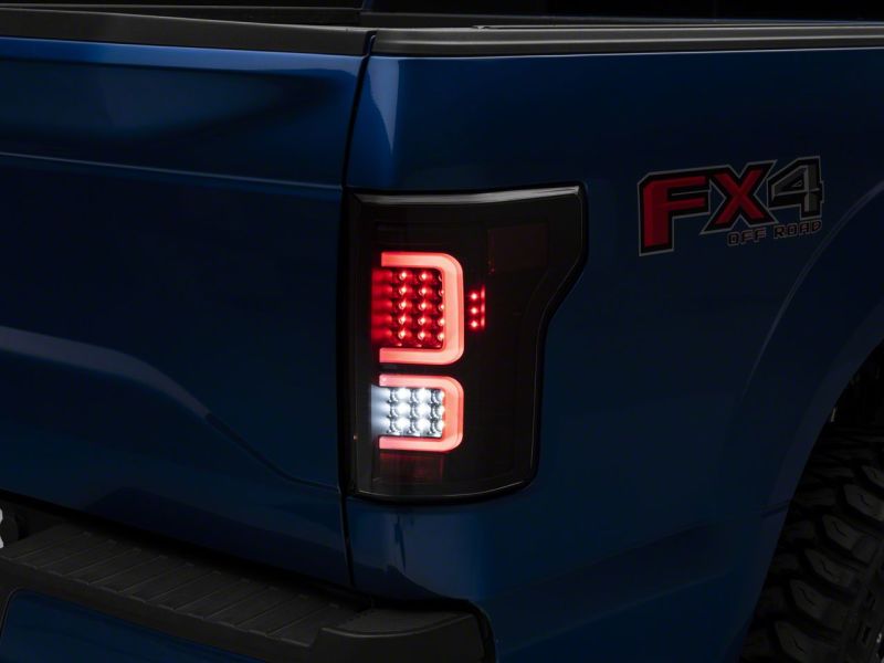 Load image into Gallery viewer, Raxiom 15-17 Ford F-150 G3 LED Tail Lights- Blk Housing (Clear Lens)
