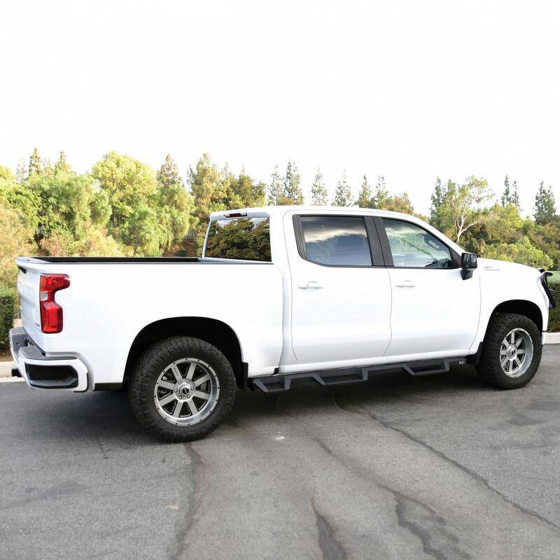Load image into Gallery viewer, Westin 2019 Chevrolet Silverado/Sierra 1500 (5.5ft) Drop Wheel to Wheel Nerf Step Bars - Txt Black
