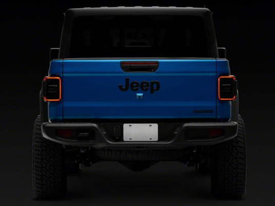 Raxiom 20-23 Jeep Gladiator JT w/ Factory Halogen LED Tail Lights- Blk Housing (Smoked Lens)