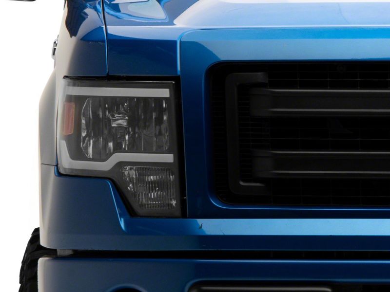 Load image into Gallery viewer, Raxiom 09-14 Ford F-150 Axial Series Headlights w/ LED Bar- Blk Housing (Clear Lens)
