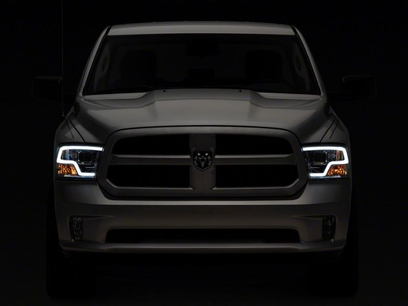 Load image into Gallery viewer, Raxiom 09-18 Dodge RAM 1500 Non-Projector LED Halo Headlights- Chrome Housing (Clear Lens)
