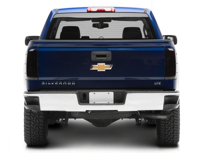 Load image into Gallery viewer, Raxiom 14-18 Chevrolet Silverado 1500 Axial Series LED Tail Lights- Blk Housing (Smoked Lens)
