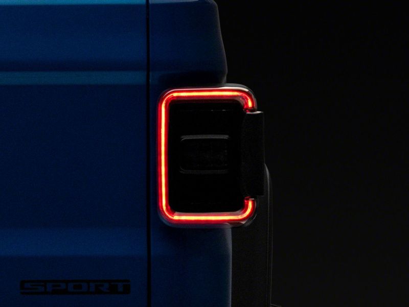 Load image into Gallery viewer, Raxiom 20-23 Jeep Gladiator JT Axial Series LED Tail Lights- Blk Housing (Smoked Lens)
