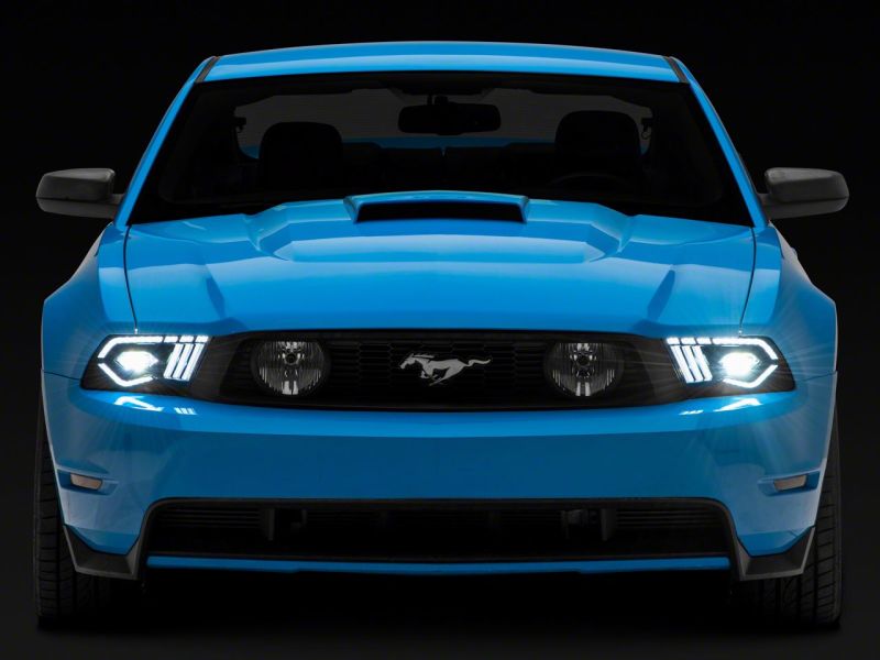 Load image into Gallery viewer, Raxiom 10-12 Ford Mustang w/ Factory Halogen LED Projector Headlights- Blk Housing (Clear Lens)
