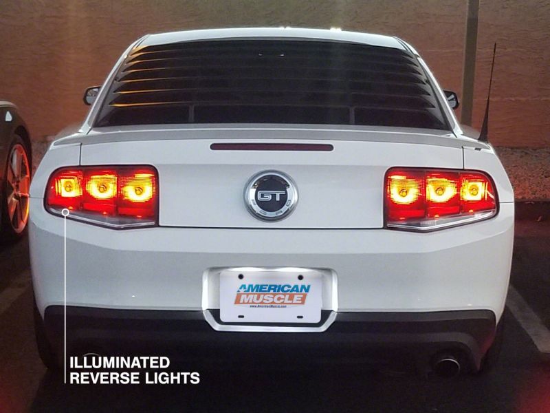 Load image into Gallery viewer, Raxiom 10-12 Ford Mustang Aero Tail Lights- Blk Housing (Smoked Lens)
