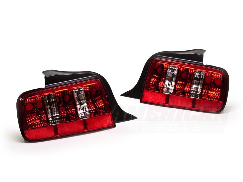 Load image into Gallery viewer, Raxiom 05-09 Ford Mustang Coyote Tail Lights- Chrome Housing - Red/Clear Lens
