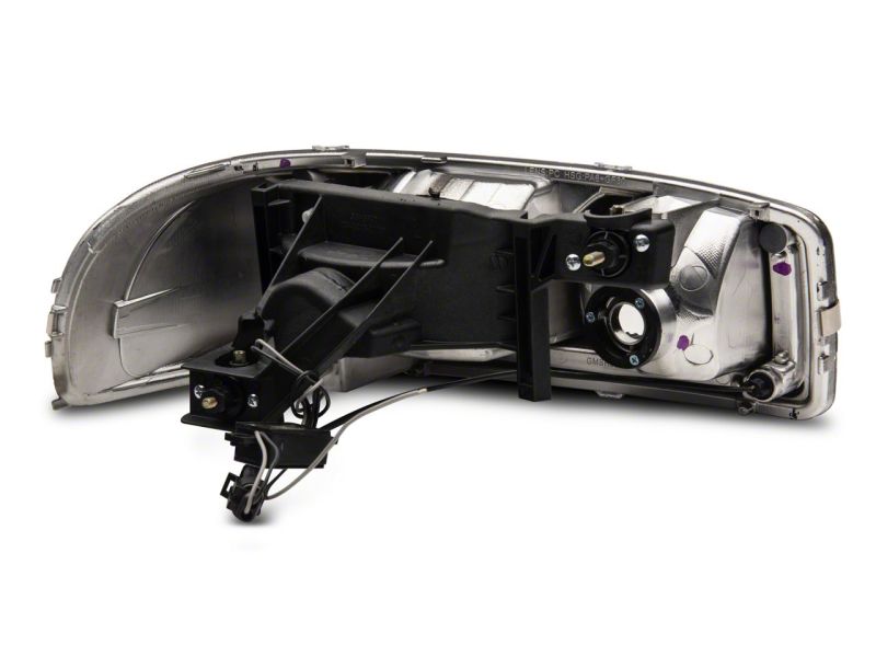 Load image into Gallery viewer, Raxiom 99-06 GMC Sierra 1500 Axial Series Headlights w/ LED Bar- Black Housing (Clear Lens)
