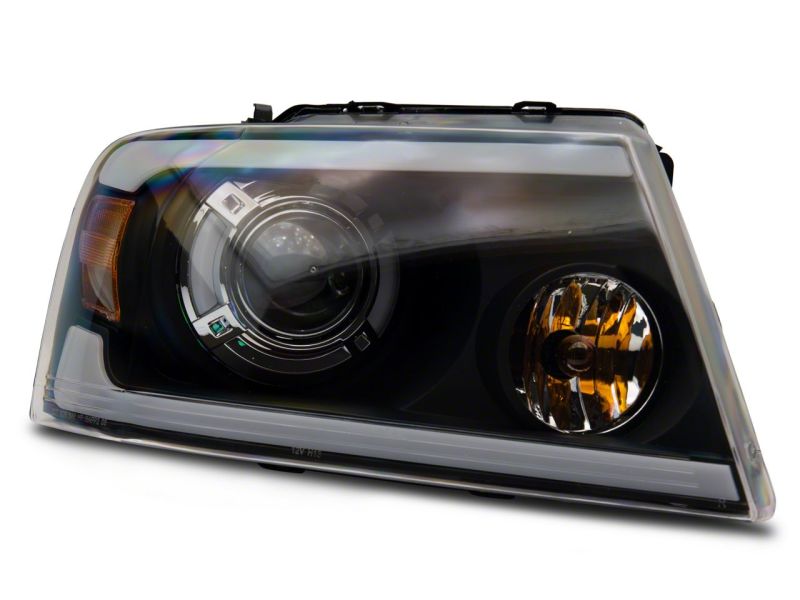 Load image into Gallery viewer, Raxiom 04-08 Ford F-150 Axial Series Projector Headlights w/ SEQL LED Bar- Blk Housing (Clear Lens)
