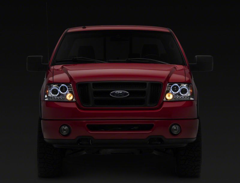 Load image into Gallery viewer, Raxiom 04-08 Ford F-150 Dual LED Halo Projector Headlights- Chrome Housing (Clear Lens)
