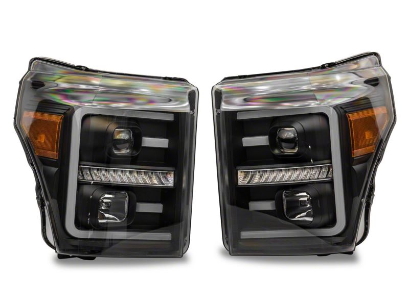 Load image into Gallery viewer, Raxiom 11-16 Ford F-250 Super Duty LED Projector Headlights - Blk Housing (Clear Lens)
