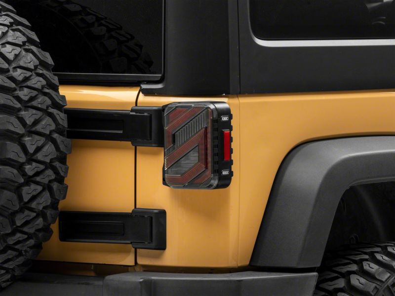 Load image into Gallery viewer, Raxiom 07-18 Jeep Wrangler JK Axial Series Trident LED Tail Lights- Blk Housing (Clear Lens)
