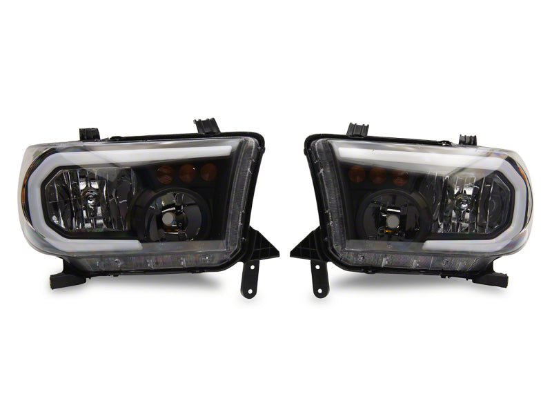 Load image into Gallery viewer, Raxiom 07-13 Toyota Tundra Axial Series Headlights w/ SEQL LED Bar- Black Housing (Clear Lens)

