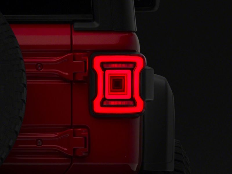 Load image into Gallery viewer, Raxiom 18-23 Jeep Wrangler JL Horizon LED Tail Lights- BlkHousing- Red Lens
