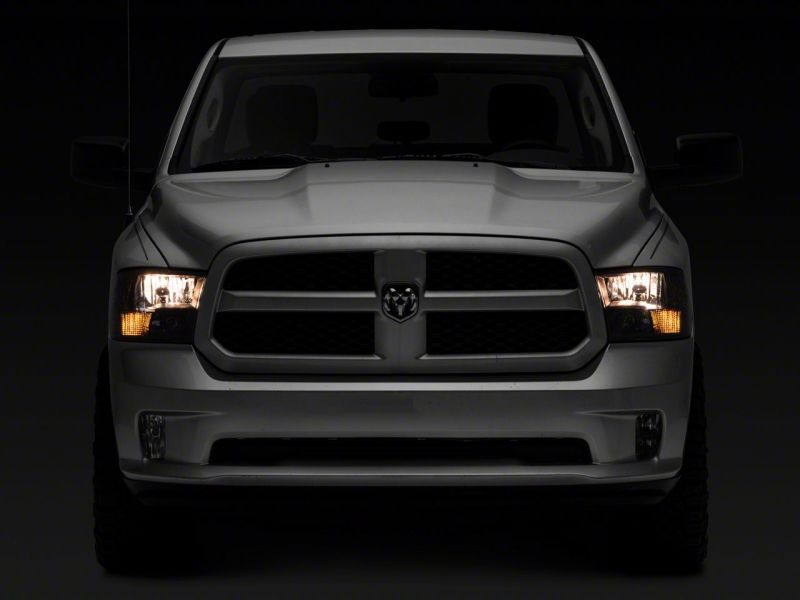 Load image into Gallery viewer, Raxiom 09-18 Dodge RAM 1500 Axial Series Euro Style Headlights w/ Dual Bulb Blk Housing (Clear Lens)
