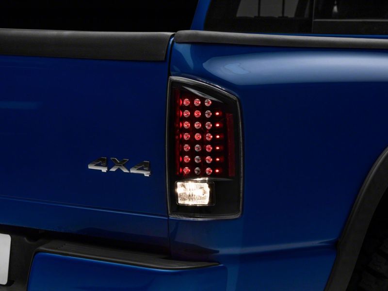 Load image into Gallery viewer, Raxiom 07-08 Dodge RAM 1500 LED Tail Lights- Blk Housing (Clear Lens)

