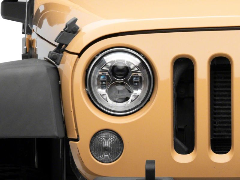 Load image into Gallery viewer, Raxiom 07-18 Jeep Wrangler JK 7-In LED Headlights- Chrome Housing (Clear Lens)
