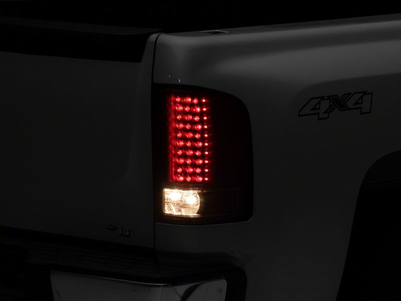 Load image into Gallery viewer, Raxiom 07-13 Chevrolet Silverado 1500 LED Tail Lights- Blk Housing (Clear Lens)
