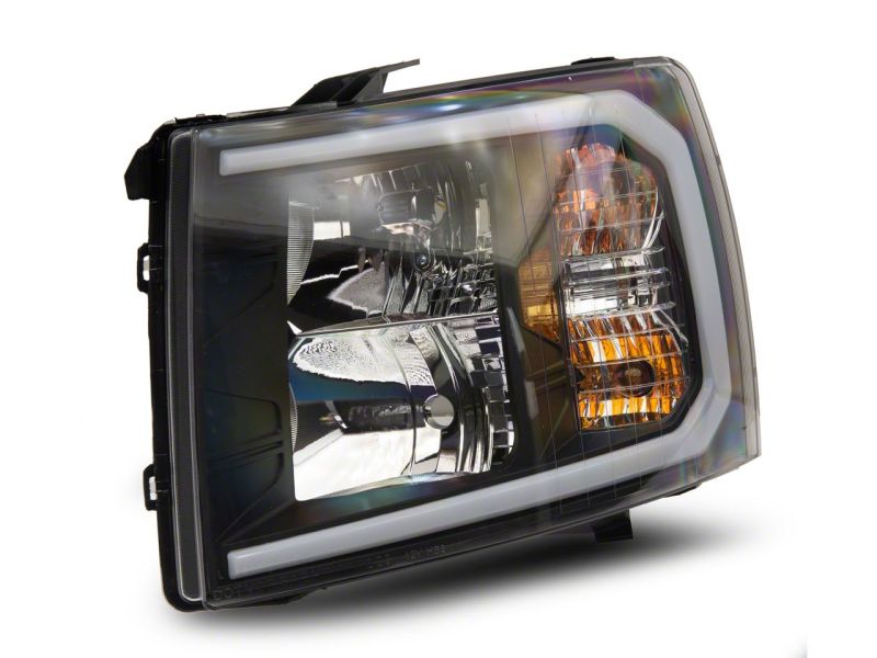 Load image into Gallery viewer, Raxiom 07-13 Chevrolet Silverado 1500 Axial Headlights w/ SEQL LED Bar- Blk Housing (Clear Lens)
