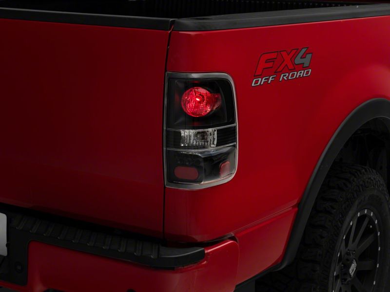 Load image into Gallery viewer, Raxiom 04-08 Ford F-150 Styleside Euro Style Tail Lights- BlkHousing - Red/Clear Lens
