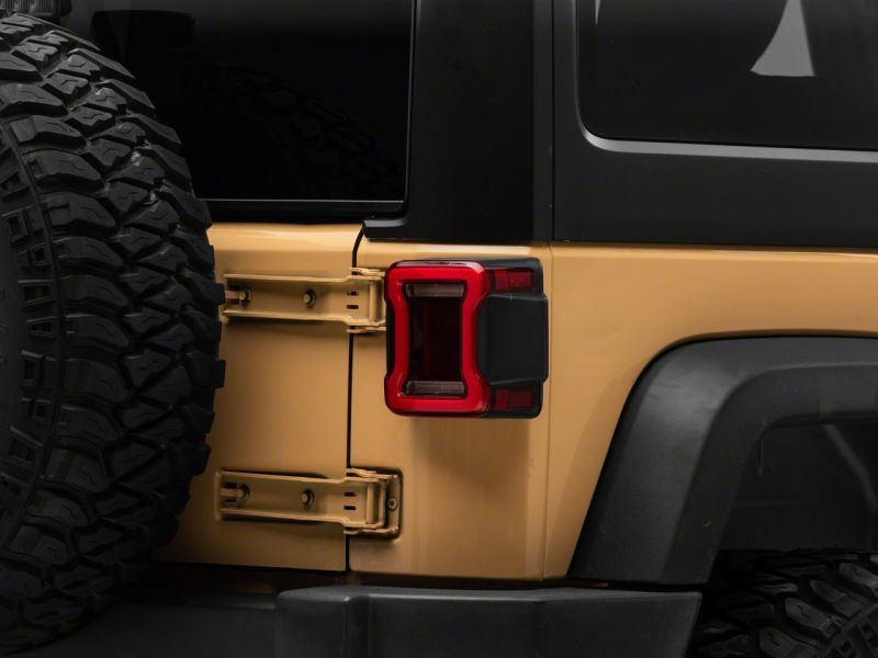 Load image into Gallery viewer, Raxiom 07-18 Jeep Wrangler JK Axial Series JL Style LED Tail Lights- BlkHousing- Red Lens
