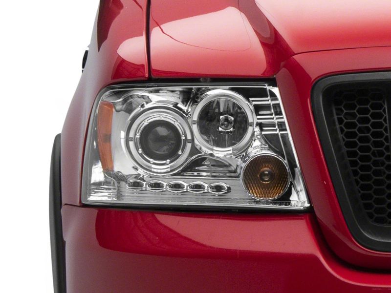 Load image into Gallery viewer, Raxiom 04-08 Ford F-150 Dual LED Halo Projector Headlights- Chrome Housing (Clear Lens)
