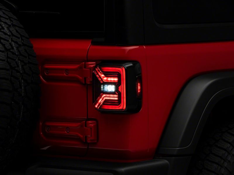 Load image into Gallery viewer, Raxiom 18-23 Jeep Wrangler JL Axial Series LED Tail Lights- Blk Housing (Smoked Lens)
