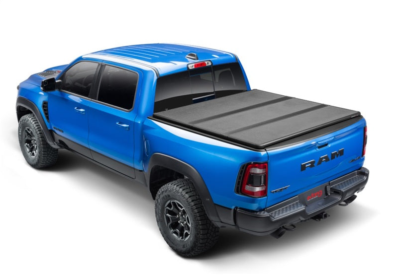 Load image into Gallery viewer, Extang 19-23 Dodge Ram w/RamBox New Body (5ft. 7in. Bed) Solid Fold ALX
