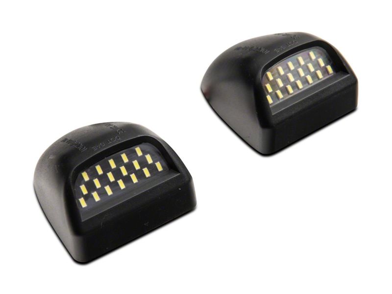 Load image into Gallery viewer, Raxiom 99-13 Chevrolet Silverado/GMC Sierra 1500 Axial Series LED License Plate Bulb Kit
