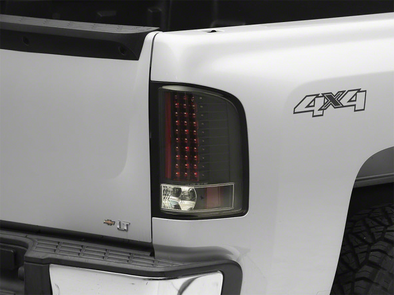 Load image into Gallery viewer, Raxiom 07-13 Chevrolet Silverado 1500 LED Tail Lights- Blk Housing (Clear Lens)
