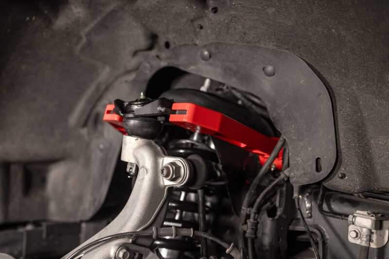 Load image into Gallery viewer, UMI Performance 15-25 Ford F-150 Adjustable Upper A-Arm Kit - Red
