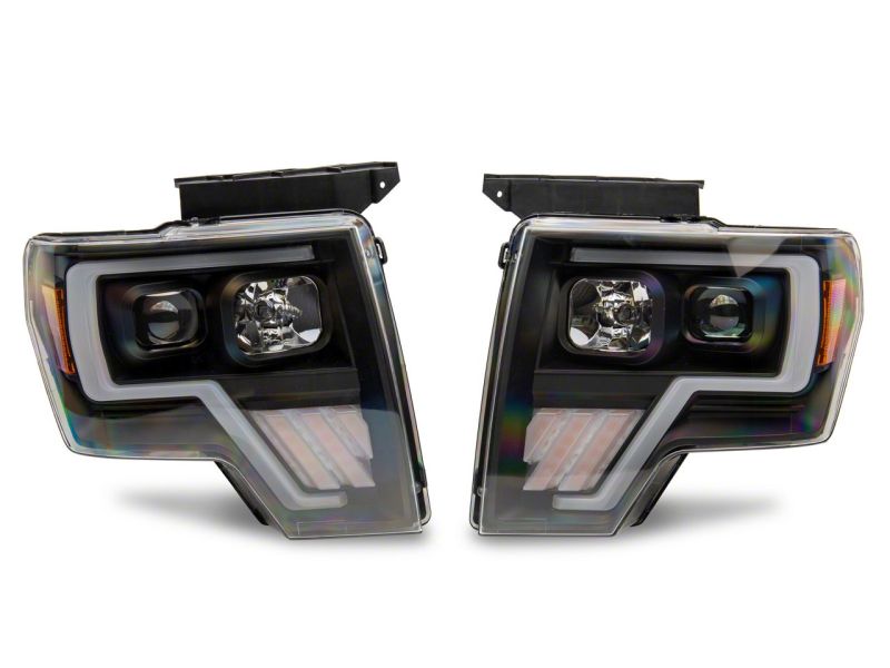 Load image into Gallery viewer, Raxiom 09-14 Ford F-150 Axial G4 Light Bar Switchback Projector Headlights- Blk Housing (Clear Lens)
