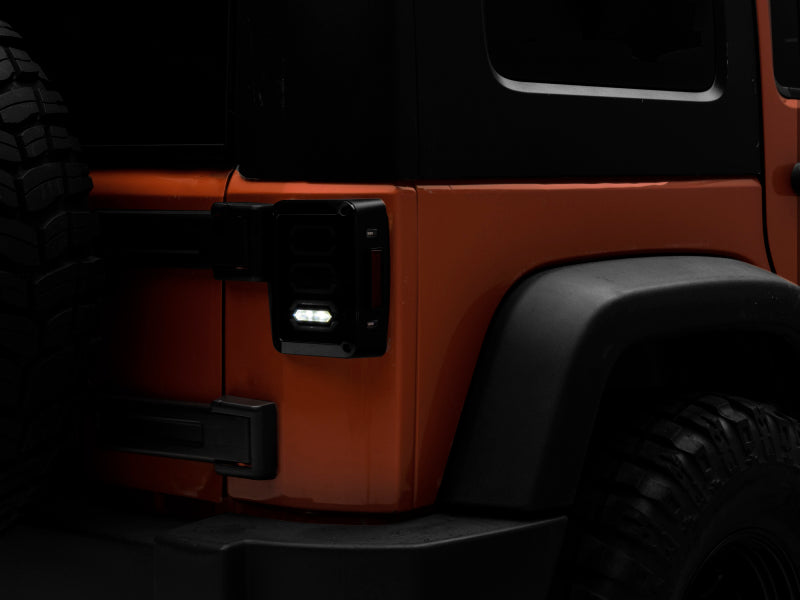 Load image into Gallery viewer, Raxiom 07-18 Jeep Wrangler JK LED Tail Lights- Black Housing (Smoked Lens)
