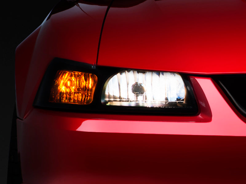 Load image into Gallery viewer, Raxiom 99-04 Ford Mustang Axial Series OE Style Headlights- Black Housing (Smoked Lens)
