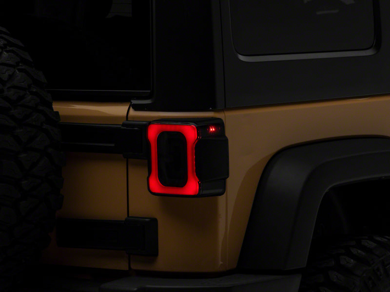 Load image into Gallery viewer, Raxiom 07-18 Jeep Wrangler JK Axial Series LED Tail Lights- Blk Housing (Smoked Lens)
