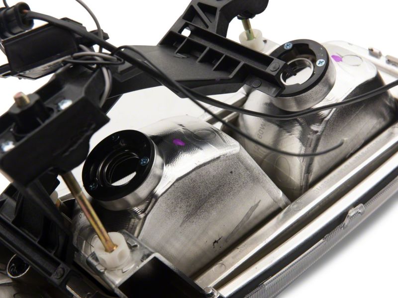 Load image into Gallery viewer, Raxiom 99-06 GMC Sierra 1500 Axial Series Headlights w/ LED Bar- Black Housing (Clear Lens)
