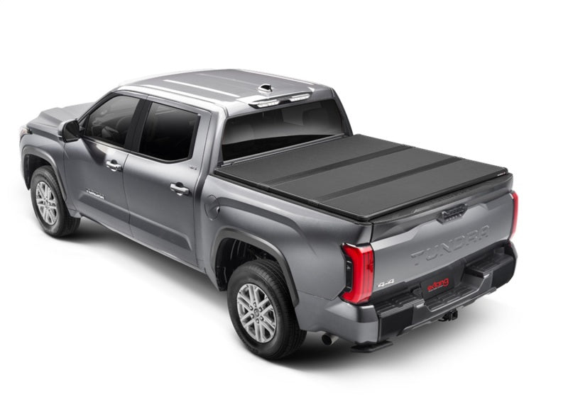 Load image into Gallery viewer, Extang 14-22 Toyota Tundra w/o Rail Sys. (5ft. 7in. Bed) Solid Fold ALX
