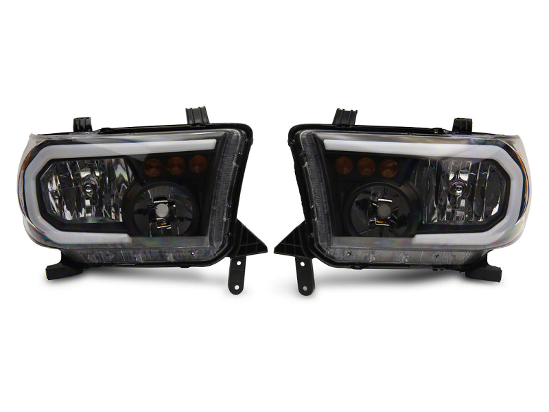 Load image into Gallery viewer, Raxiom 07-13 Toyota Tundra Axial Series Headlights w/ LED Bar- Black Housing (Clear Lens)
